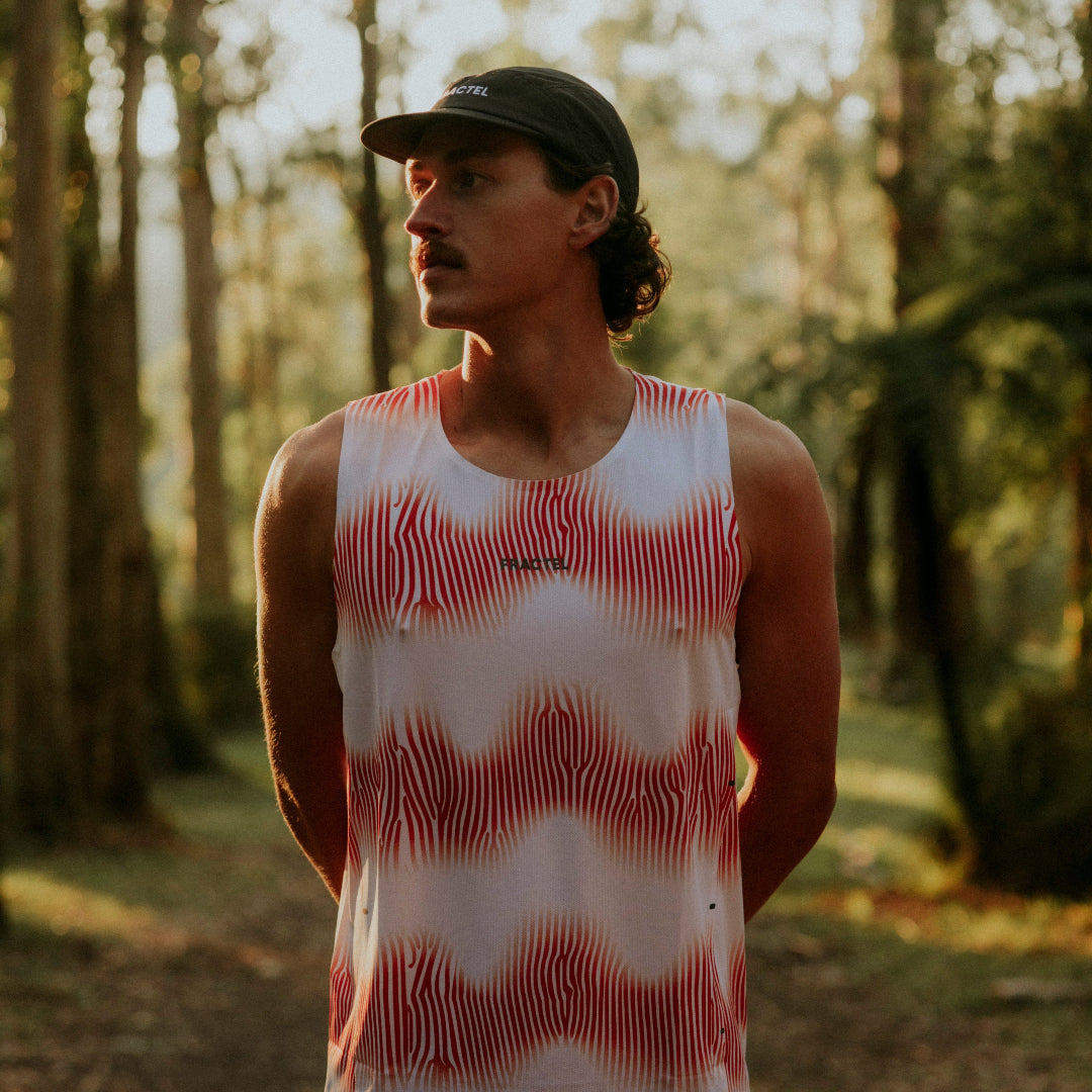 VELOCITY ORANGE Mens Velocity Running Singlet on Model