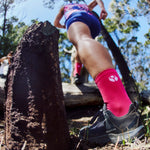 Unisex Pink Performance Running Socks on Model