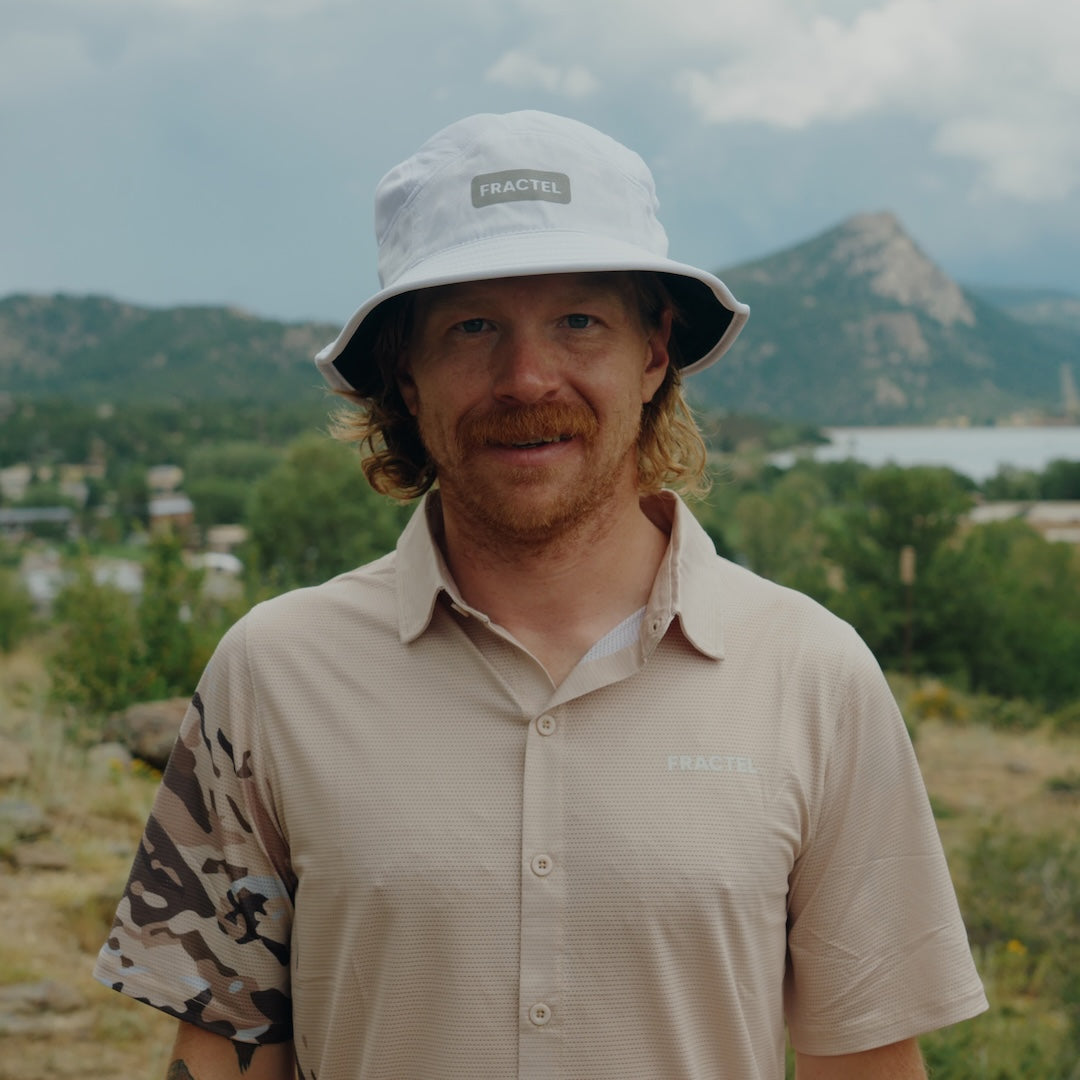 Runner wearing the Fractel B-LUMEN Bucket Hat