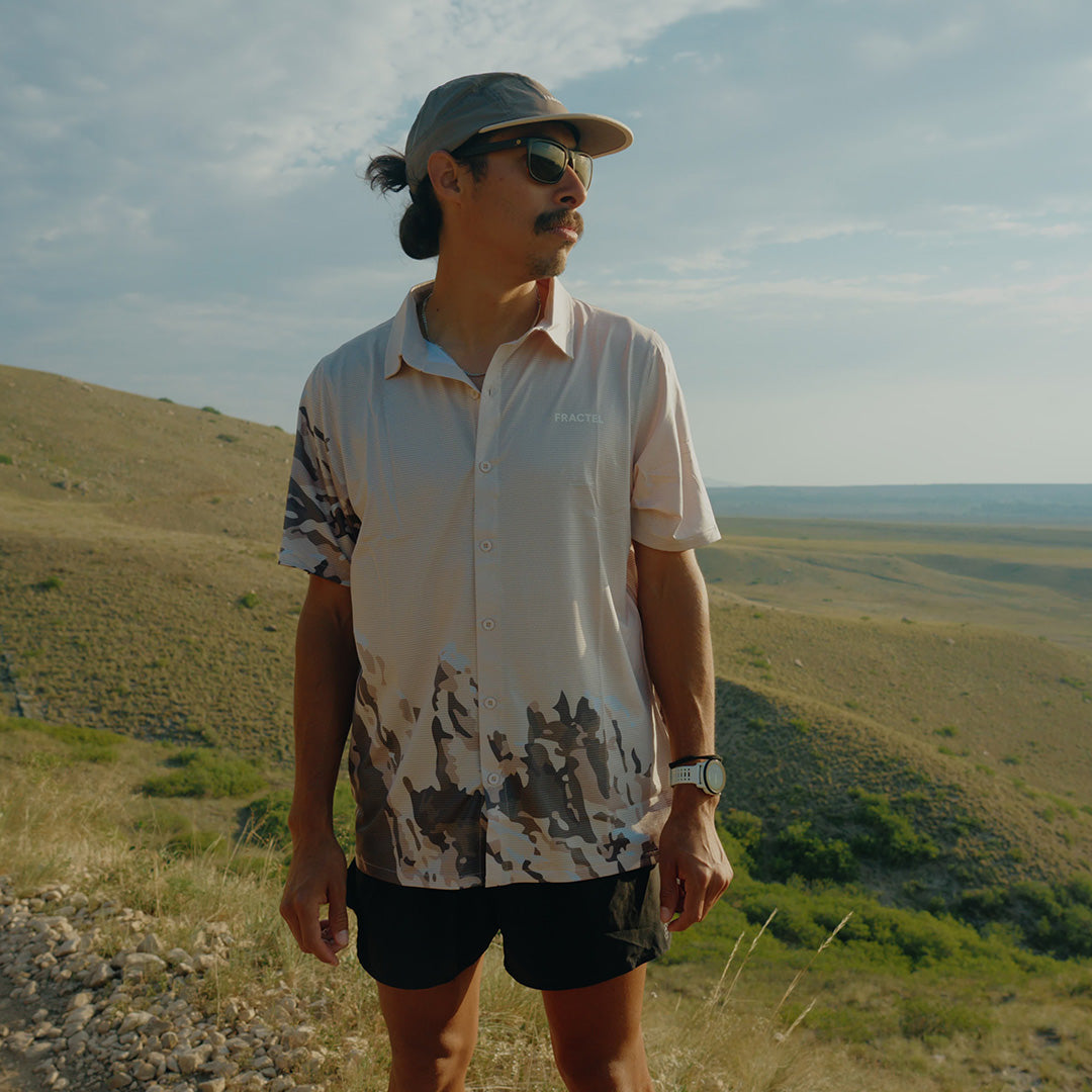 Runner wearing the Fractel S-ROCKIES Adventure Shirt - Limited Edition