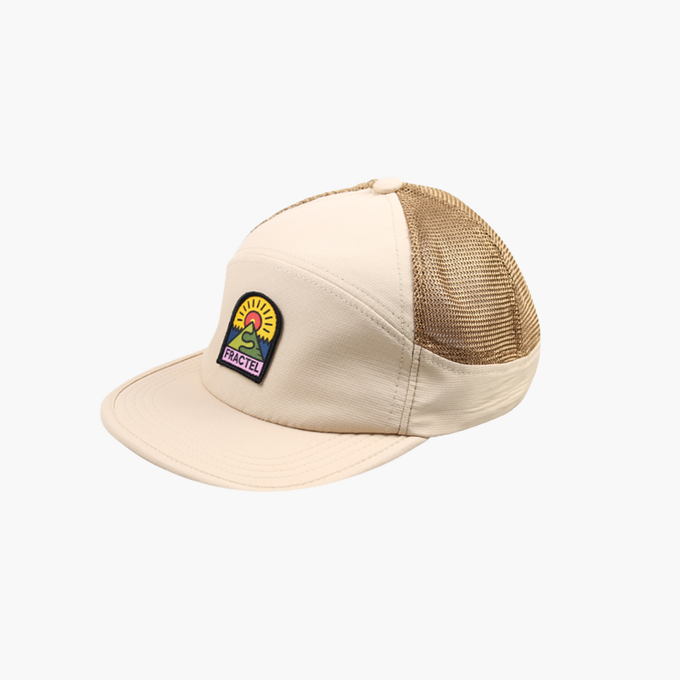 A beige and tan trucker cap with a curved brim, featuring a colorful embroidered 'Sunrise Eagles' patch on the front left panel, set against a plain white background.