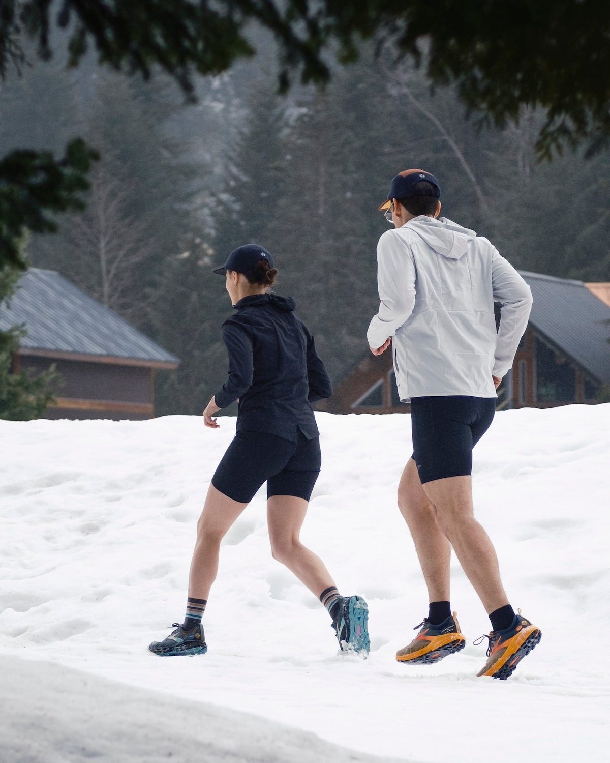 Winter legionnaire hat range: runners in Fractel caps and jackets in the snow