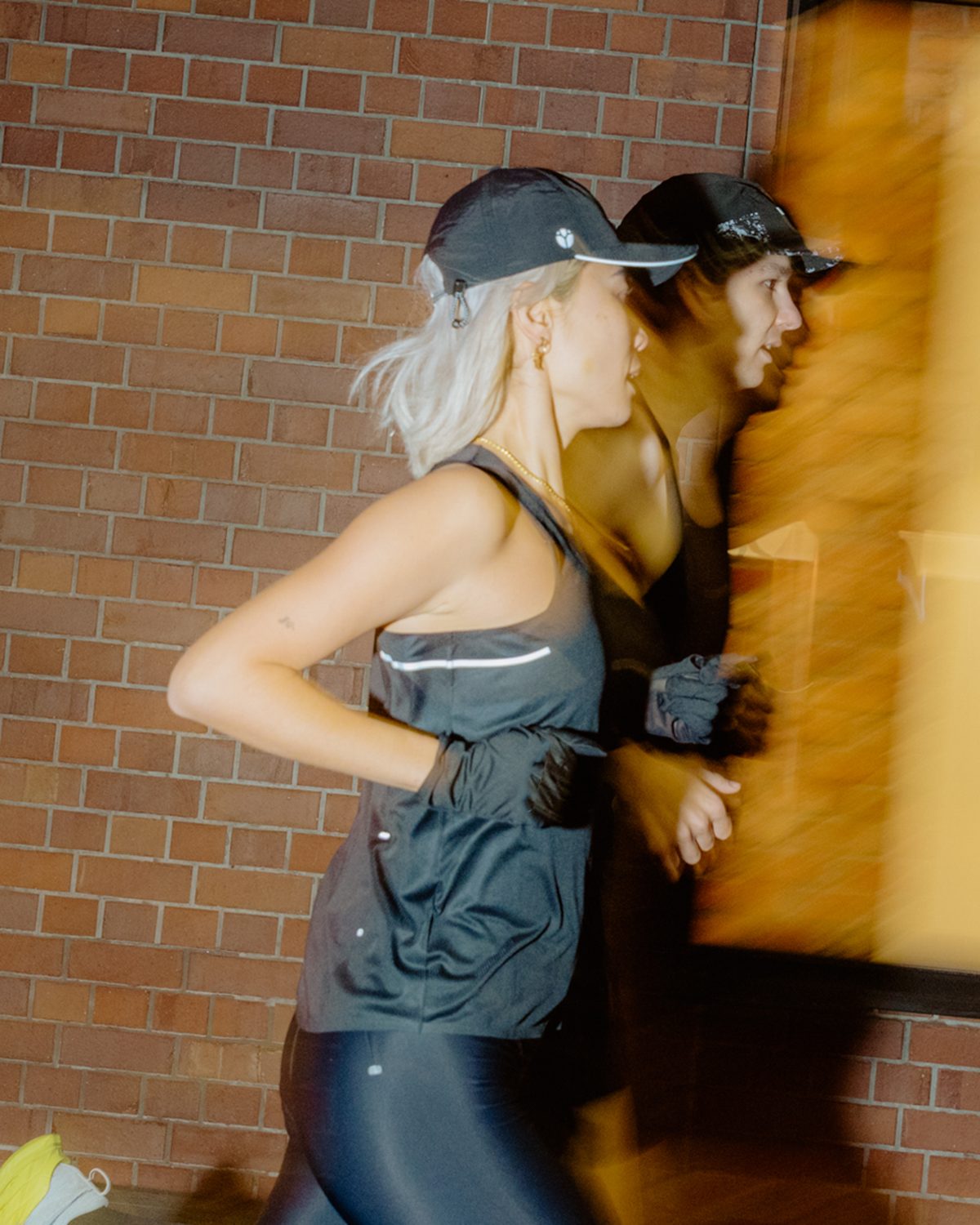 Ladies running singlet in grey worn on a night run